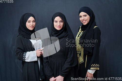 Image of Portrait of Arab women wearing traditional clothes or abaya