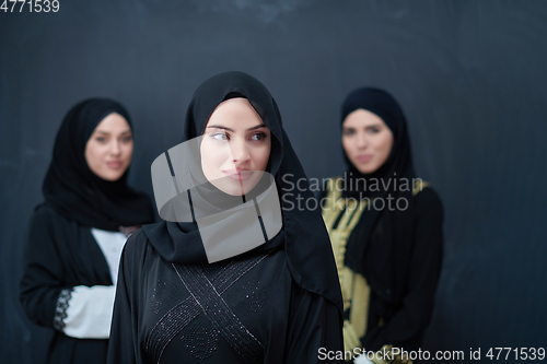 Image of Portrait of Arab women wearing traditional clothes or abaya