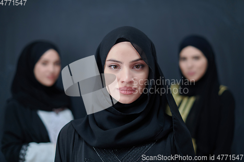 Image of Portrait of Arab women wearing traditional clothes or abaya