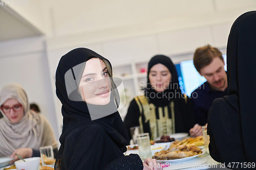 Image of Muslim family having iftar together during Ramadan.