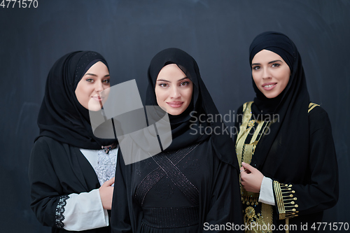 Image of Portrait of Arab women wearing traditional clothes or abaya