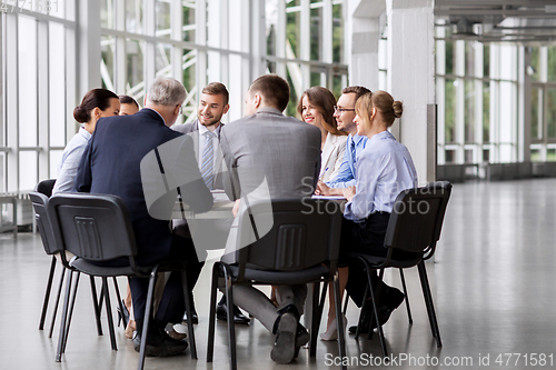 Image of business team meeting at office