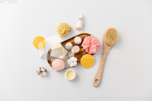 Image of crafted soap, sponges, brush and natural cosmetics