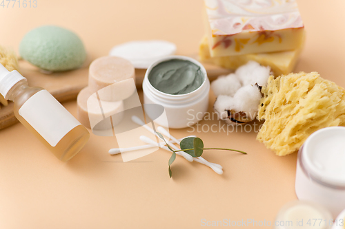 Image of soap, brush, sponge, clay mask and body butter