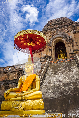 Image of Gold Buddha, Wat Chedi Luang temple big Stupa, Chiang Mai, Thail