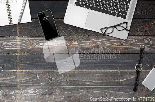 Image of Wooden office desk mockup top view