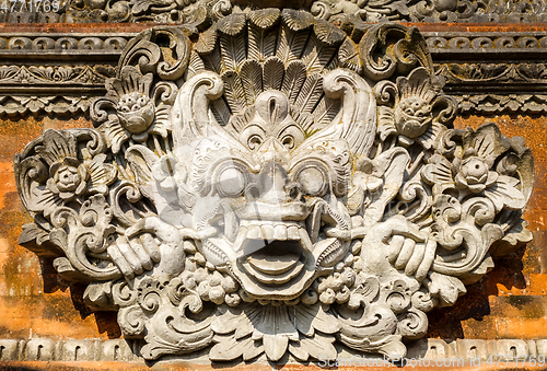 Image of Statue on a temple entrance door, Ubud, Bali, Indonesia
