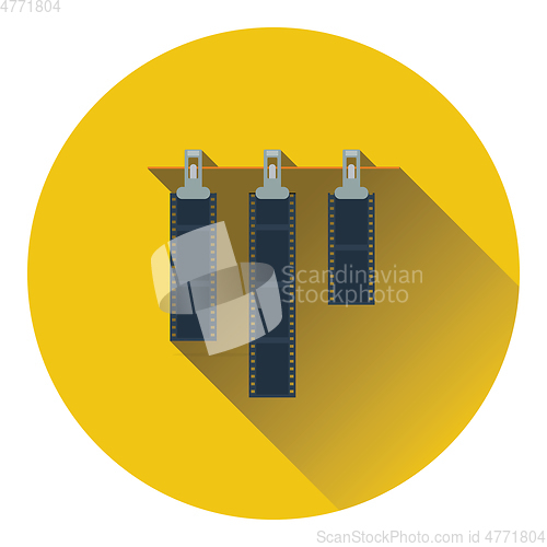 Image of Icon of photo film drying on rope with clothespin