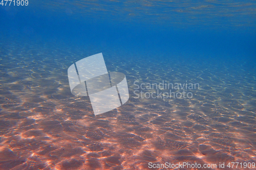 Image of clear sand under sea water