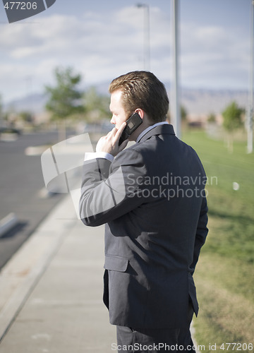 Image of Businessman on cell phone