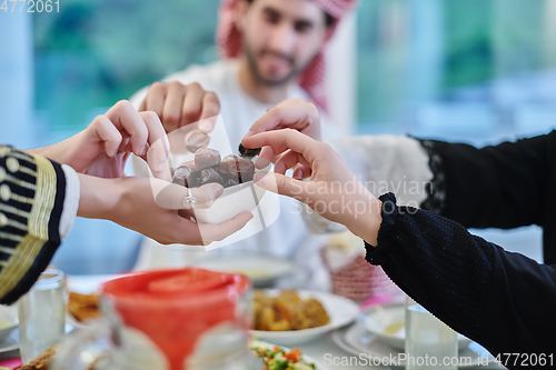 Image of Muslim family having iftar together during Ramadan.