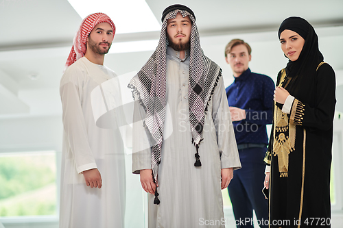 Image of Group portrait of muslim businessmen and businesswoman