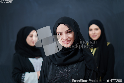 Image of Portrait of Arab women wearing traditional clothes or abaya