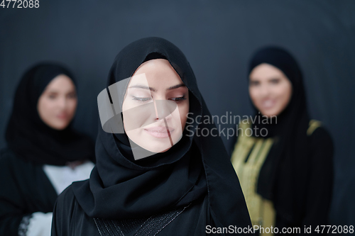 Image of Portrait of Arab women wearing traditional clothes or abaya