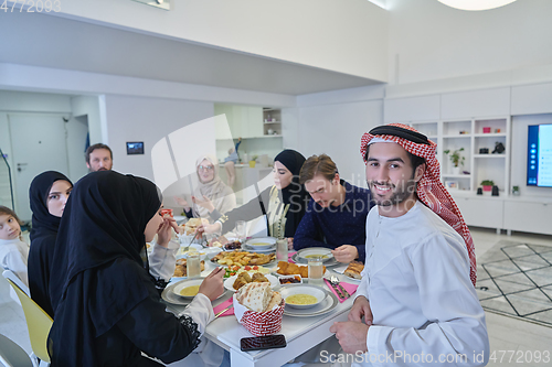 Image of Muslim family having iftar together during Ramadan.