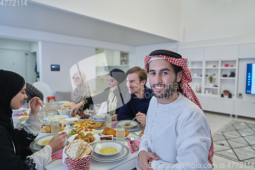 Image of Muslim family having iftar together during Ramadan.