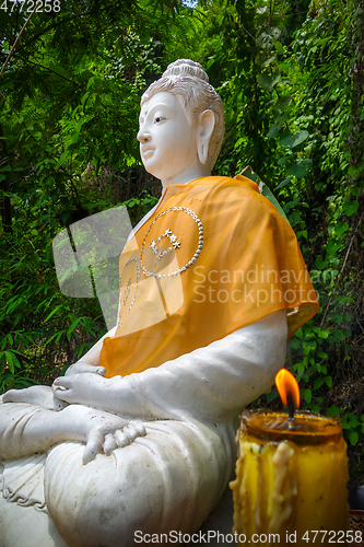 Image of Buddha statue in jungle, Wat Palad, Chiang Mai, Thailand