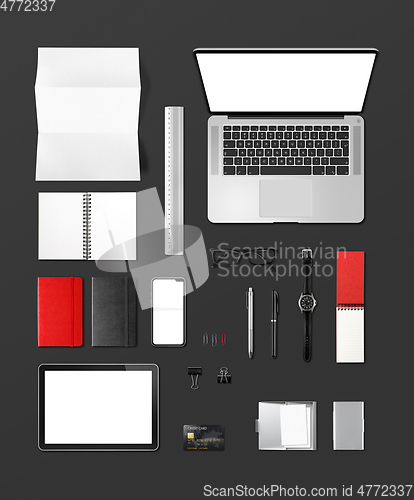 Image of Office desk branding mockup top view isolated on black