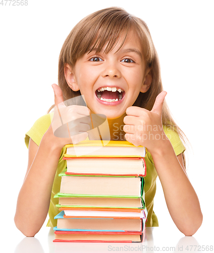 Image of Little girl with her books