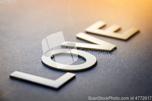 Image of Word love written with white solid letters