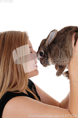 Image of Young woman holding up a small rapid 