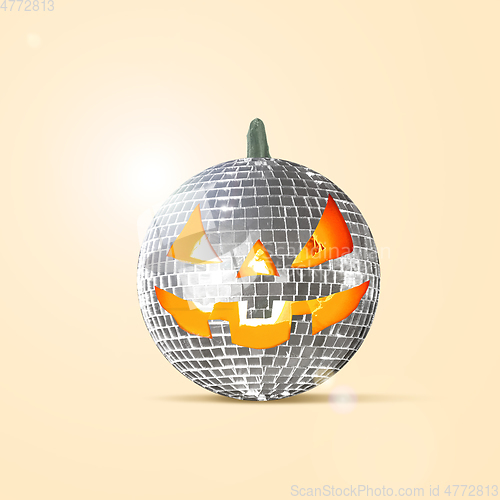 Image of Scary pumpkin on yellow background, the night of fear