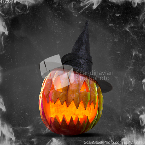 Image of Scary pumpkin on black smoke background, the night of fear