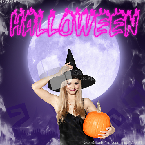 Image of Young woman in hat as a witch on purple background