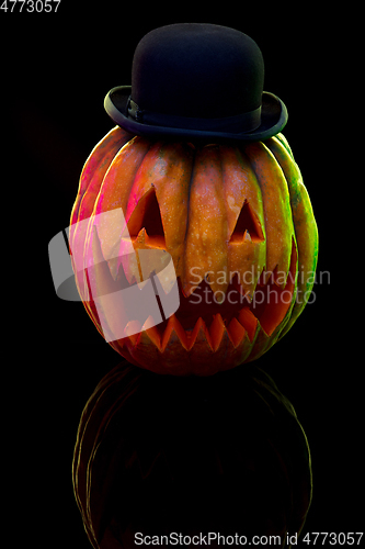 Image of Halloween pumpkin head jack lantern with scary evil face