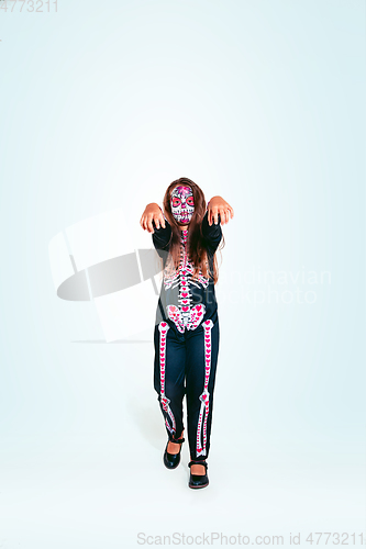 Image of Little girl like a zombie on white background
