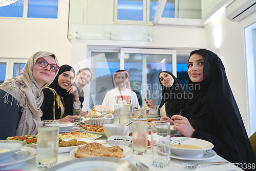 Image of Muslim family having iftar together during Ramadan.