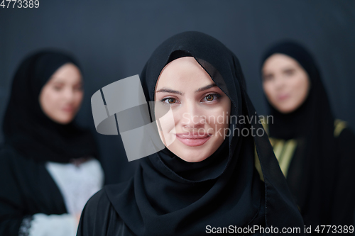 Image of Portrait of Arab women wearing traditional clothes or abaya