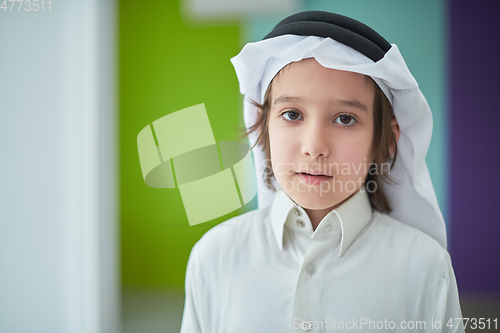 Image of Portrait of Arabian boy in traditional clothes