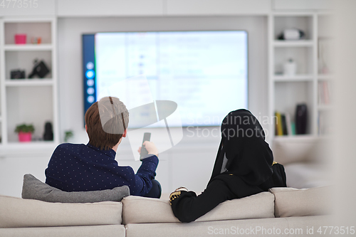 Image of Young muslim couple enjoing time together at home during Ramadan