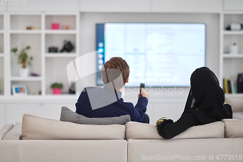 Image of Young muslim couple enjoing time together at home during Ramadan