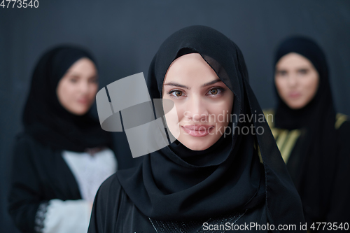 Image of Portrait of Arab women wearing traditional clothes or abaya