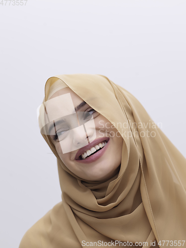 Image of Portrait of young muslim woman wearing hijab