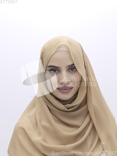 Image of Portrait of young muslim woman wearing hijab