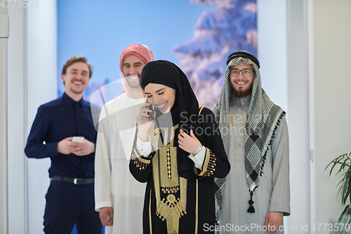 Image of Group portrait of muslim businessmen and businesswoman