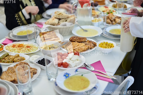 Image of Muslim family having iftar together during Ramadan