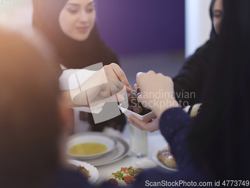 Image of Muslim family having iftar together during Ramadan