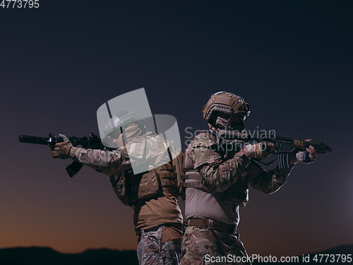 Image of soldiers squad in night mission