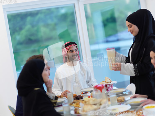 Image of Muslim family having iftar together during Ramadan