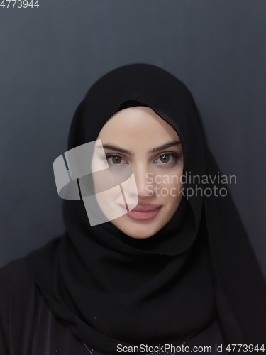 Image of Portrait of young muslim woman wearing hijab