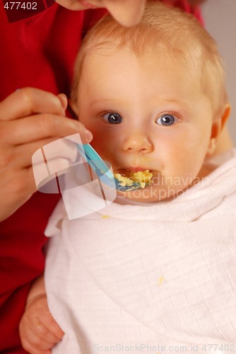Image of Feeding of a small hungry baby