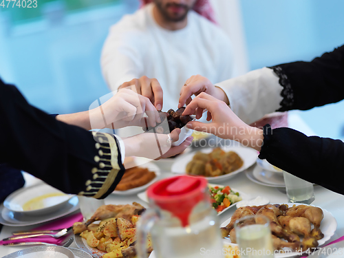 Image of Muslim family having iftar together during Ramadan