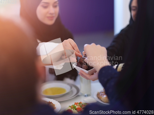 Image of Muslim family having iftar together during Ramadan