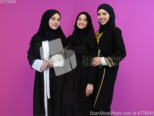 Image of Portrait of Arab women wearing traditional clothes or abaya