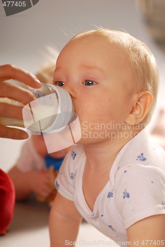 Image of Baby during the drinking of milk