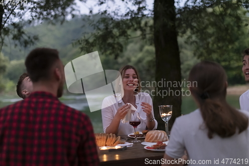 Image of french dinner party on summer